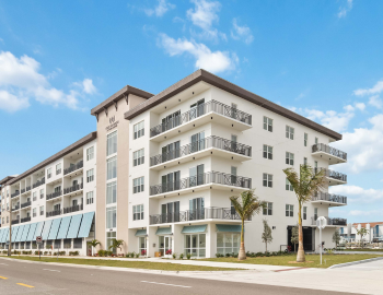 the exterior of a condo complex in madeira beach