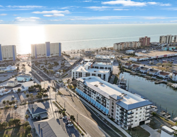 a low aerial view of the oceanfront in madeira beach fl